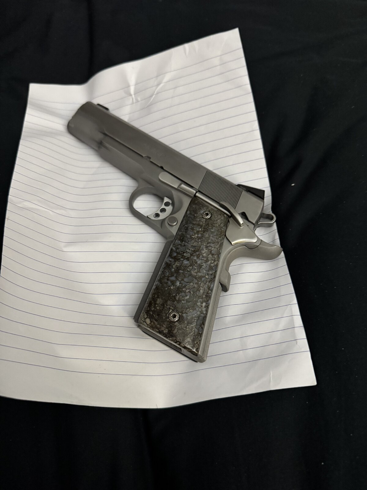 2025 10 17 Les Baer Custom Carry 45 ACP 5' Stainless with fossil dinosaur grip.jpeg